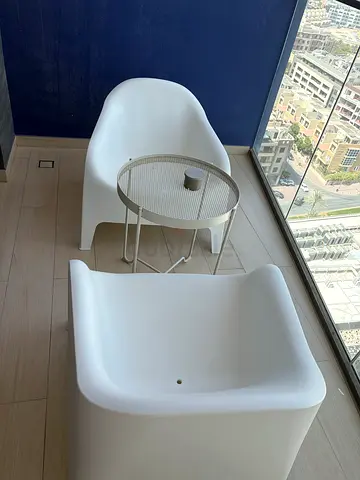 Set of 2 Minimalist White Plastic Lounge Chairs with Small Round Side Table