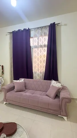 2 Light mauve 3-seater sofa with cushions - good condition ( DELIVERY NOT AVAILABLE ONLY PICKUP)