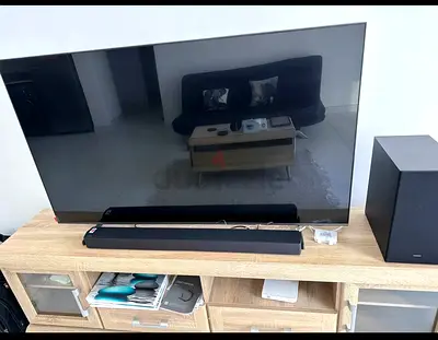 2023 Samsung 55inch QLED Q60C 4K smart tv, with Samsung HW C450 soundbar.