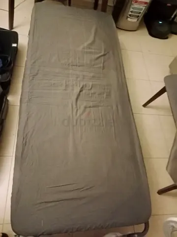 Must sell by Friday, 24 July: Single foldable guest bed / rollaway bed with mattress