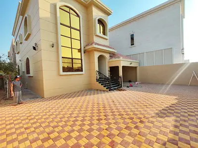 5BR villa in Al Mowaihat 1 with large yard and spacious layout, ideal for families.