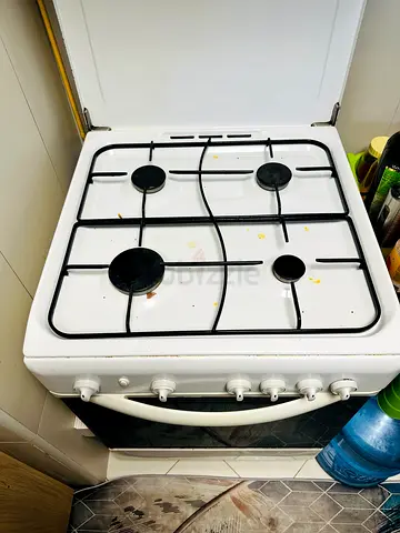 Used 4-burner gas cooker with oven - good working condition