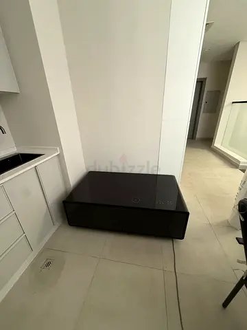 Low black TV cabinet / media console in good condition