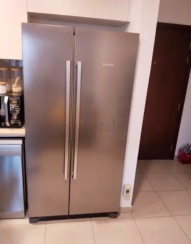 Bosch side by side refrigerator neat and clean perfect working