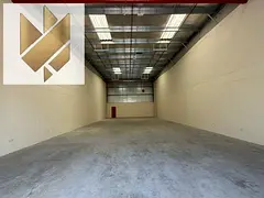 A warehouse in a prime location within the industrial zone, featuring a wide entrance that facilitat