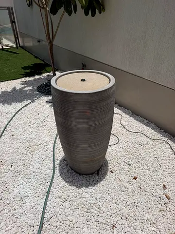 Tall outdoor water fountain planter - grey ribbed ceramic