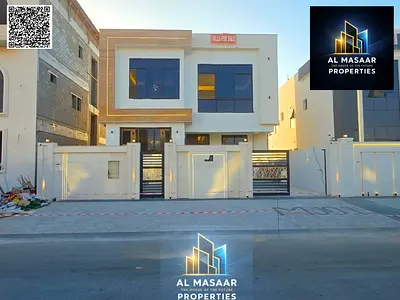 Luxury villa for sale in Al Helio, Ajman, close to all services, with a very spacious area, price including registration fees and easy bank financing.
