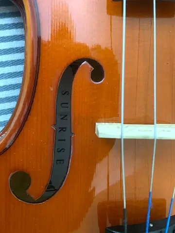 Sunrise full-size violin in good condition with case and bow