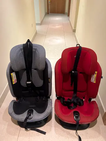 Two Child Car Seats (Red and Grey) – Good Condition