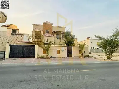 Residential/commercial villa in Al Muwaihat 1 [Ajman], on a main street and close to services, price includes electricity, water, and air conditioning