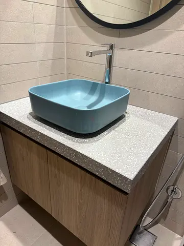 Modern bathroom vanity unit with countertop basin