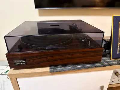 Vintage belt-drive turntable with dust cover — working condition
