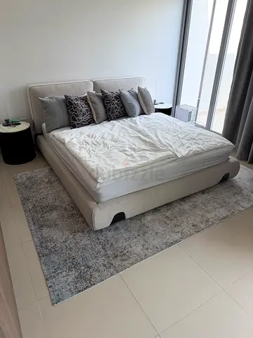 Light grey upholstered double bed with headboard and mattress - excellent condition