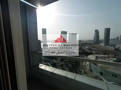Two-bedroom apartment with a living room for rent on Al Taawun Street