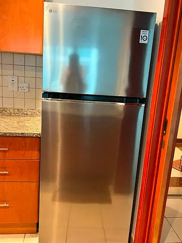 LG Stainless Steel Top Freezer Refrigerator - Good Condition