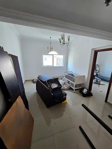 Annual rent in Muwaileh Commercial Sharjah One bedroom apartment with hall master bedroom two bathrooms central AC central gas parking included 35000