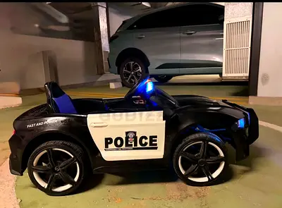 Kids Electric Ride-On Police Car with Lights - Good Condition