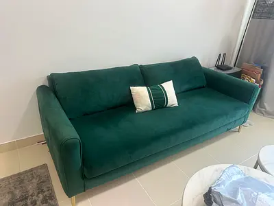 Green three-seater velvet sofa in good condition, Serious buyers only. Want to sell fast