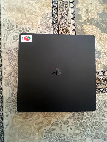 Sony PlayStation 4 Slim console 500 GB with controller