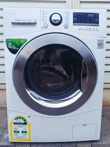 LG 8kg washer with 6kg dryer, white color, condition is perfectly working.