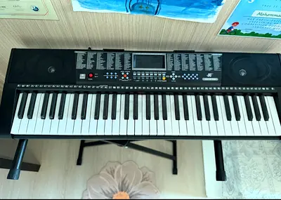 61-Key Electronic Keyboard with Built-in Speakers and Stand