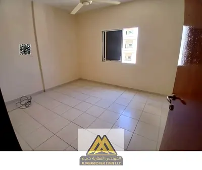 Annual rent: 1BR apartment in Al Nuaimiya 2, Ajman. Sheikh Khalifa Street, separate hall, closed ki