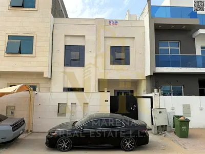 Modern two-story villa with a rooftop terrace for sale, including registration and ownership fees. Freehold ownership available to all nationalities d