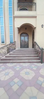 For rent in Al Muwaihat 1, Ajman: A mixed-use (residential/commercial) villa featuring 8 rooms, a li