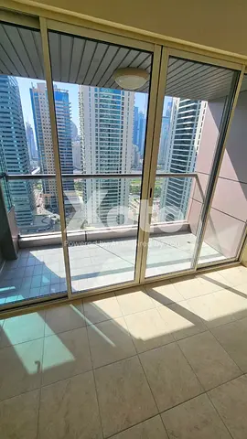 Spacious 1BR | Balcony | Lake & Skyline Views | Prime JLT Location | AED 80K