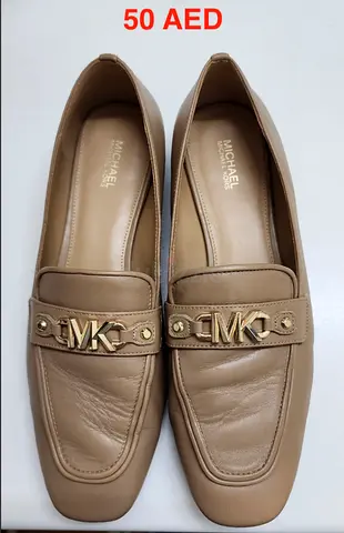 Beige Michael Kors leather loafers - size EU 39, gently used