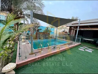 A villa with all electricity, water and air conditioning fees included, on the main street, ready to move in, in the most prestigious areas of Ajman.