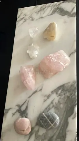 Small collection of raw crystals (rose quartz, clear quartz, agate) from multiple waterfalls in Sri