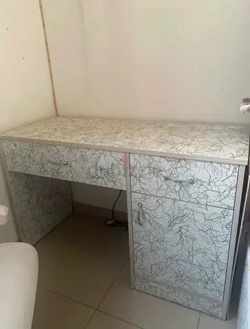 White patterned study desk with drawers — good condition
