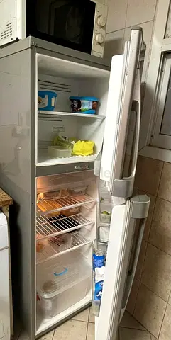 Tall double -door fridge freezer - good working condition