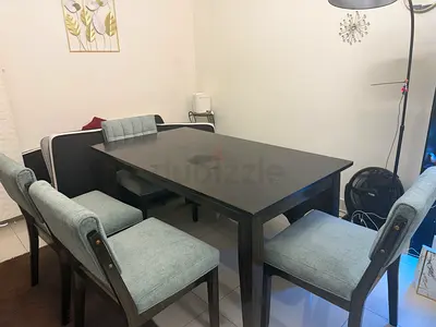 Solid Dark Wood Dining Table with 6 Upholstered Chairs - Good Condition