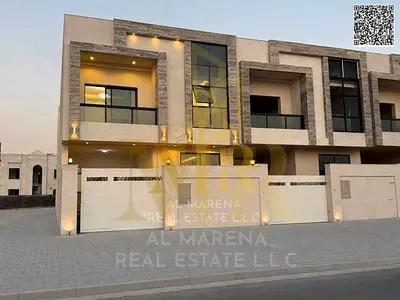 Two-story villa with five rooms, prime location near public amenities, price includes registration and ownership fees. Villa for sale in Al-Haliyo 1