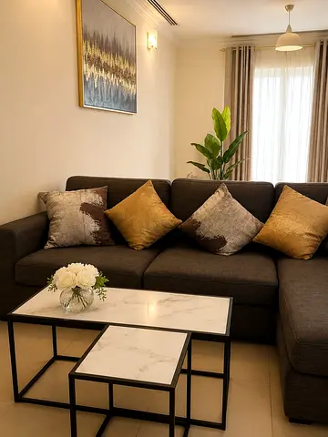 L-shaped grey fabric sofa with a marble-top coffee tables and 2 Armchairs + Shoe cabinet + Unit