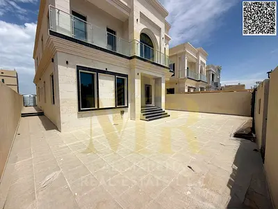 Luxury villa for sale in Al Rawda 3 | Street and alley | 5000 sq ft | 5 master bedrooms | Majlis and living room | Large yard | Elegant design | Price