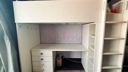 White loft bed with built-in desk, shelves and ladder — good condition