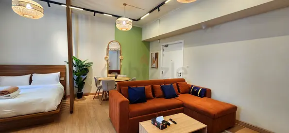 Orange sofa with chaise lounge