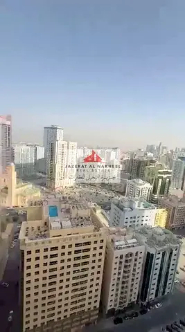 For rent: a one-bedroom apartment with a living room in Al Majaz 2, Al Qasba. It has an area of 800 sq ft, ready to move in, in an excellent location