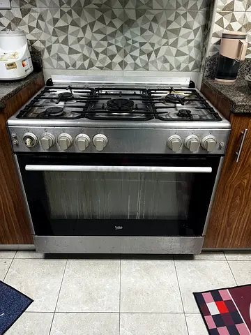 Stainless Steel 4-Burner Gas Range with Oven - Good Condition