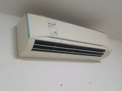 Used Wall-Mounted Split Air Conditioner - Good Working Condition