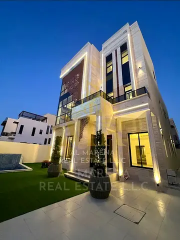 The epitome of luxury and privacy in Al-Aliya: A modern two-story villa with a private pool and rooftop terrace, priced inclusive of registration and
