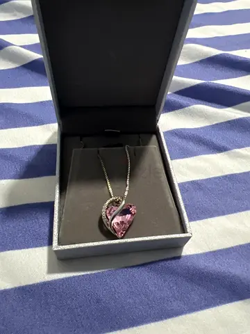 Silver necklace with purple heart pendant (never worn)