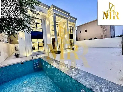 Enjoy luxury with a swimming pool and elevator | Own a luxurious villa in Al Rawda, Ajman | 6 master bedrooms and a rooftop terrace | A great deal at