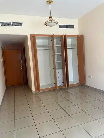 For annual rent: 3 bedrooms, a living room, and 4 bathrooms—offering the most spacious layout at the lowest price in Sharjah.