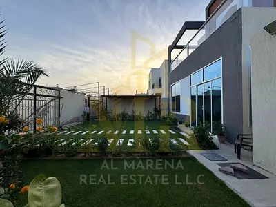 Al Muwaihat 1, a corner villa on two streets, on an area of 5700 square feet, with a majlis, living room, separate external annex, and 5 rooms. The