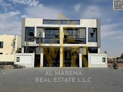 Own a 5-bedroom, two-story townhouse with a rooftop terrace, including registration and ownership fees, in the Al Yasmin area on the main road. Own a