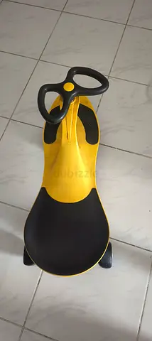 Yellow Plasma Car / Wiggle Ride-On for Kids - Good Condition